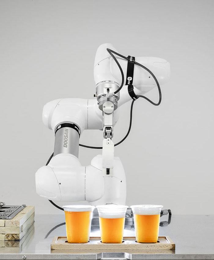 Automazione robotica per la somministrazione della birra in grandi eventi
